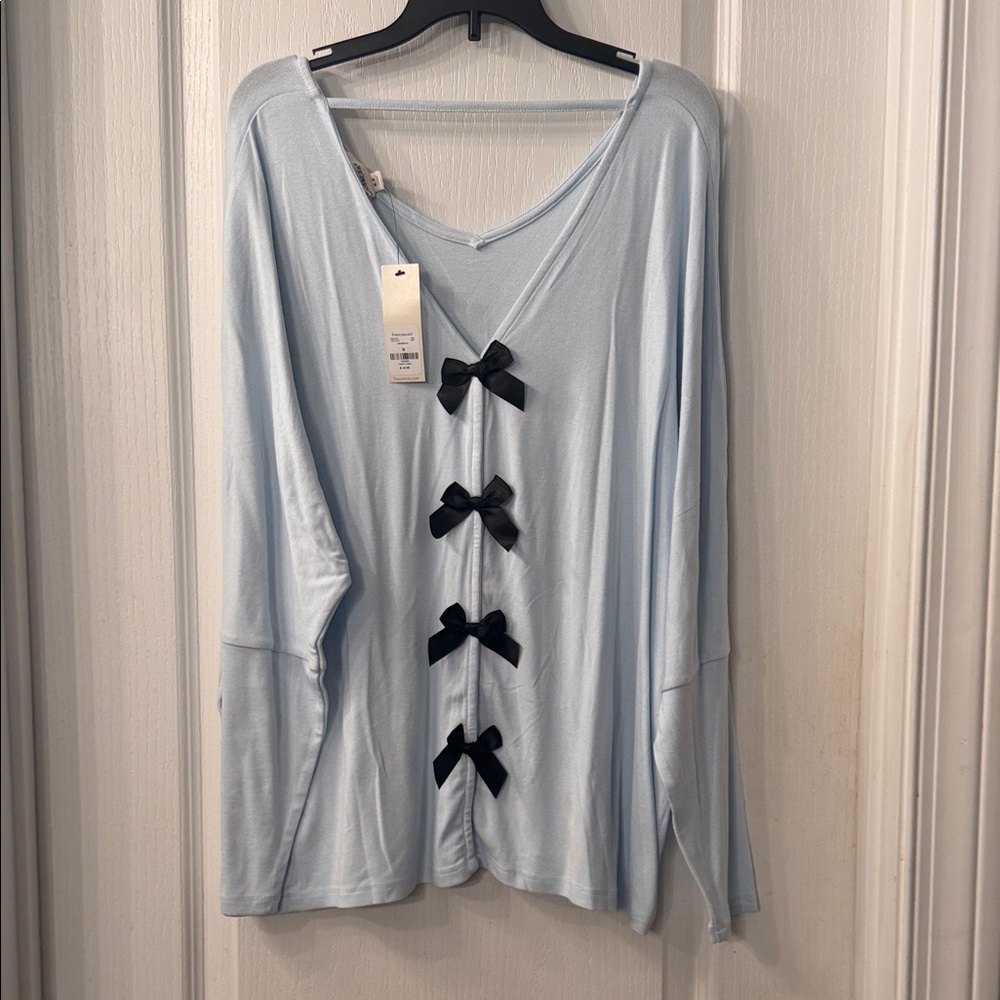 Francesca's Light Blue Long Sleeve Top with Black Bow Details